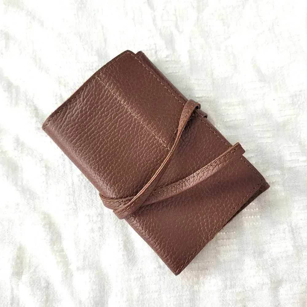 Mark & Graham brown pebbled leather charger rollup pockets tie closure minimal